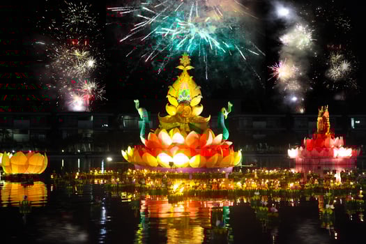 Big and small boats with candles and flowers are given for Thailands traditional Loy Krathong Festival photo