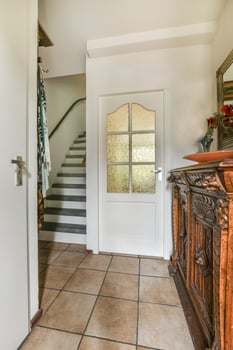 A hallway with a door photo