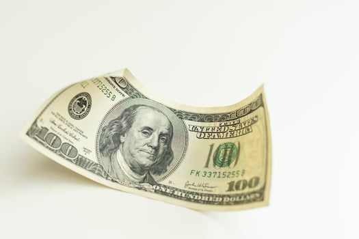dollars, banknotes on white background. Top view. new bills photo