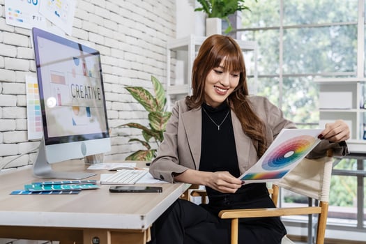 Young asian woman graphic designer working in office. Artist Creative Designer Illustrator Graphic Skill Concept, corporate women in creative marketing team working on project management, thinking photo