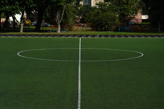 The center of the football field. The school stadium. Football field photo