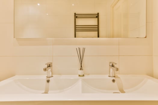 A bathroom with a sink and mirror photo