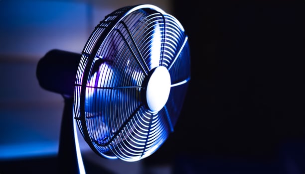Close-up of a fan with blue light photo