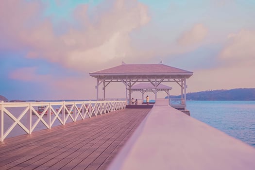 pavilion on a tropical paradise island by the sea, under a sunny sky. photo