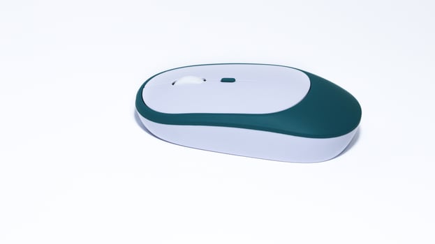 A white computer mouse isolated on a white background. photo