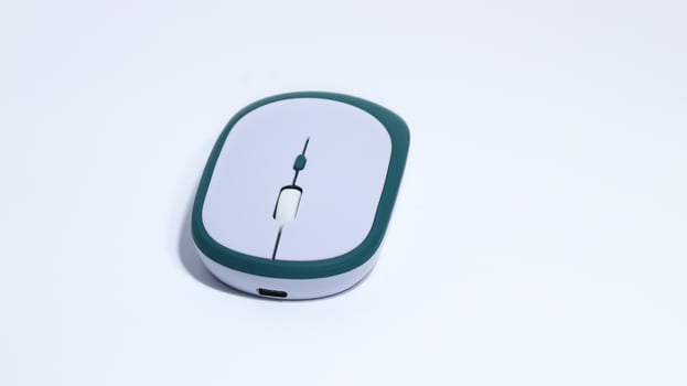 A white computer mouse isolated on a white background. photo