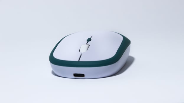 A white computer mouse isolated on a white background. photo