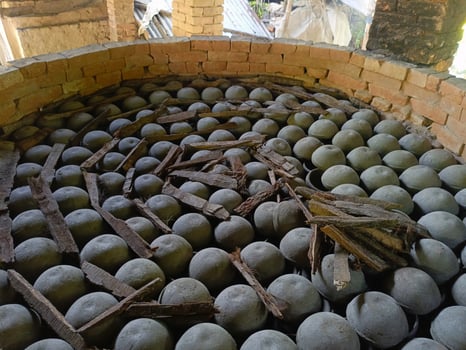 Village Pottery Making View Traditional Pots Against a Beautiful Natural Canvas photo
