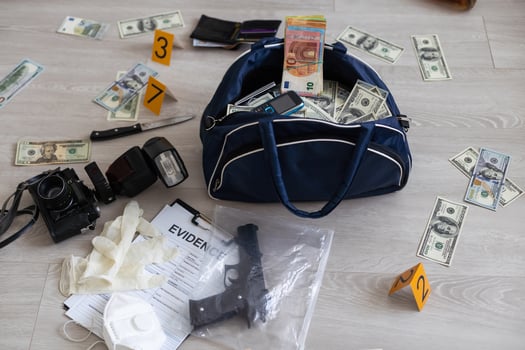 Guns and drugs concept - top view of cocain packages, drug bags and gun with bullets. Narcotics street distribution. photo