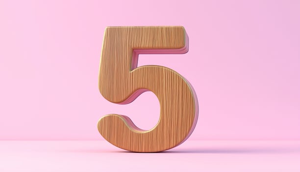 Shape number 5 made from pieces wooden textured in pastel background photo