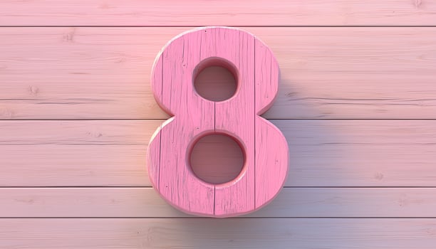 Shape number 8 made from pieces wooden textured in pink pastel background photo