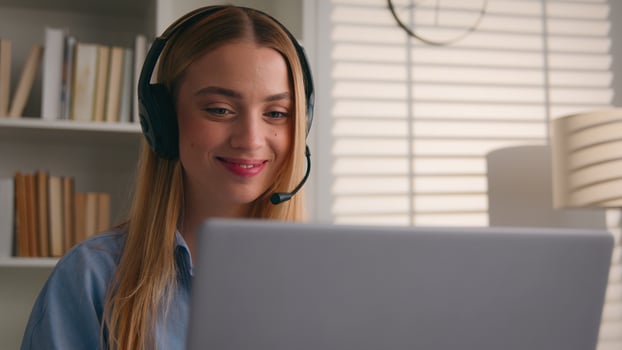 Caucasian woman business girl distant student internet teacher call conference class lesson e-learning virtual meeting nod head yes positive answer listen music headphones with laptop in office photo