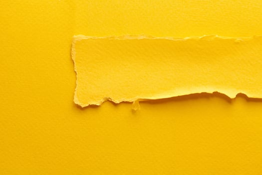 Abstract Art Collage of Torn Paper and Sticky Notes in Yellow Tones photo
