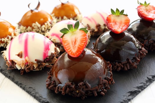 Tray with delicious catering cakes photo