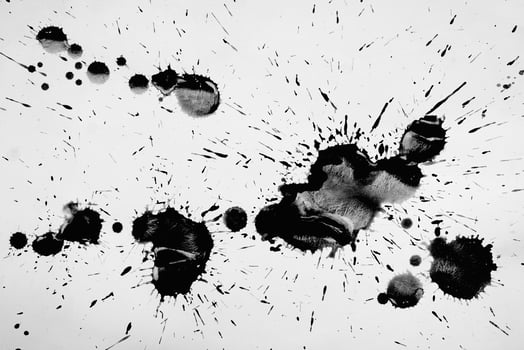 Black blots and spots on a white background. photo