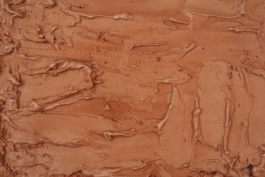 Chocolate ice cream texture. Top view. Delicious cool treat. photo