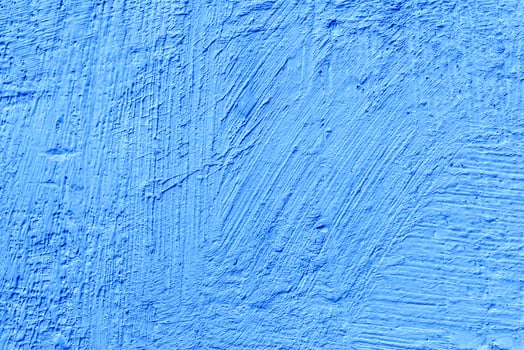 Blue stucco texture. Architectural abstract background. Blue wall of building. photo