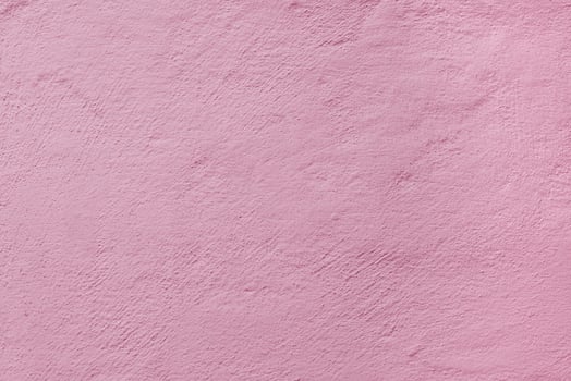 Pink stucco texture. Architectural abstract background. Pink wall of building. photo