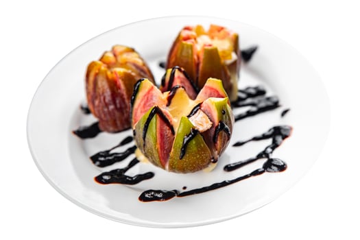 figs baked with cheese camembert or brie fresh meal food snack on the table copy space food background rustic top view keto or paleo diet vegetarian vegan food photo