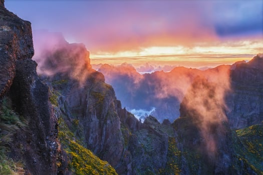 Mountains on sunset covered in fog and clouds. Madeira island, Portugal photo