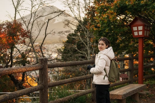 Woman tourist with mount Fuji at Chureito Pagoda in Autumn season, Traveler travel Arakurayama Sengen Park, Yamanashi, Japan. Landmark for tourist attraction. Japan Travel, Destination and Vacation photo