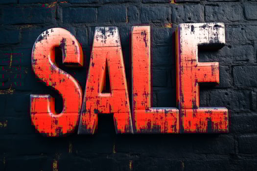 Bold, distressed red SALE text on a dark, textured background, creating a striking and impactful visual photo