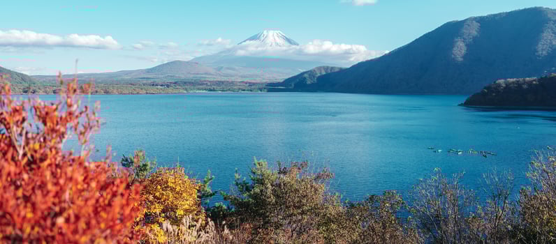 Mount Fuji at Lake Motosu in Autumn season. Mt Fujisan in Fujikawaguchiko, Yamanashi, Japan. Landmark for tourists attraction. Japan Travel, Destination, Vacation and Mount Fuji Day concept photo