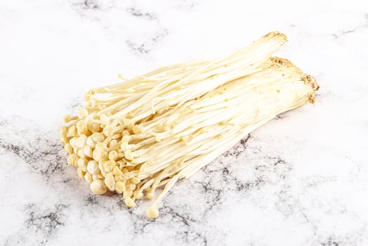 Tasty raw enoki mushroom heap photo