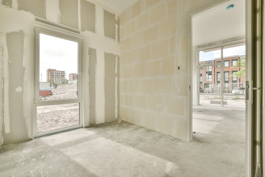 A room with a window and a door in it photo