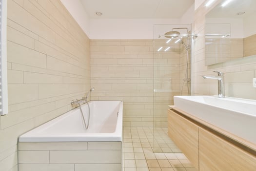 A bathroom with a sink, bathtub, and shower photo