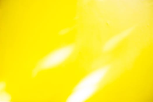 Luxury of light yellow and gold blurred gradient background has a little abstract light. sunlight shadow blurred photo