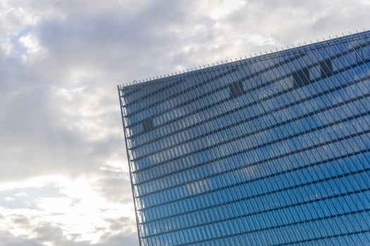 modern architectural background, glass and metal facade of contemporary building photo