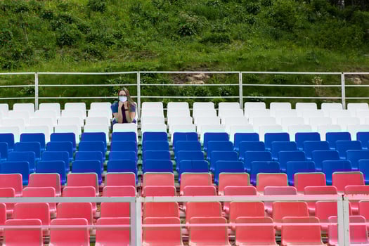 Lonely woman on the empty stadium outdoor photo