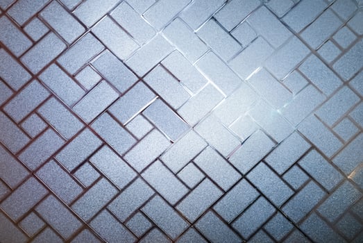 Frosted Glass Door or Wall with Geometric Pattern and Backlight Reflection photo