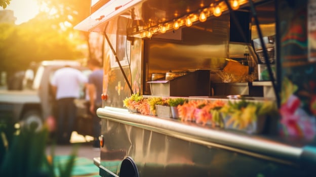 Closeup of a food truck with a picturesque backdrop, showcasing the rise of food culture and Instagramworthy dishes. photo
