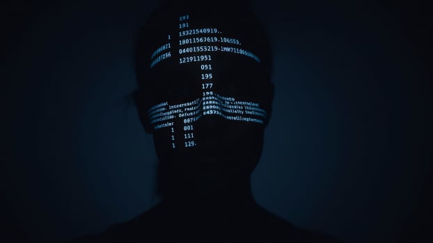Hacker Silhouette with Digital Code photo