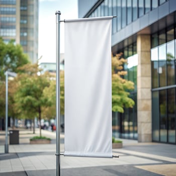 Outdoor banner flag mockup. Blank clear vertical white poster with space for logo or text among office buildings in the city photo