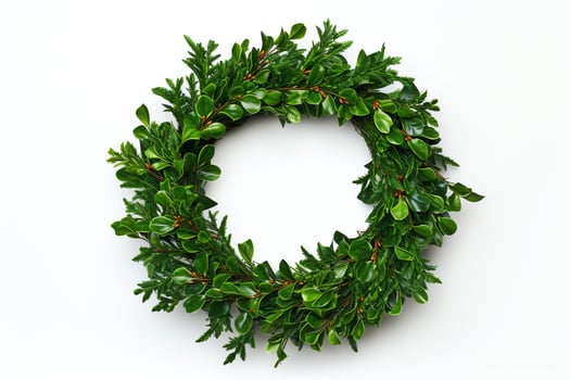 A beautiful wreath of green leaves and red berries. Perfect for Christmas or any other special occasion. photo