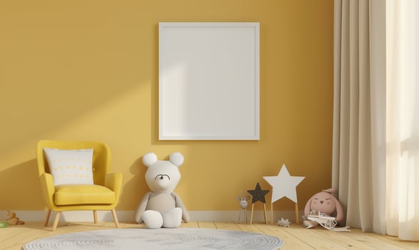 Modern and cozy kids room with empty picture frame displaying on the wall, sunlight shining through the curtain into the room photo