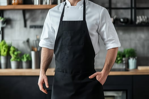 chef stands confidently in the kitchen ready to prepare a culinary masterpiece photo