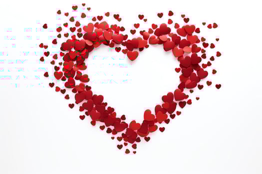 A heart made of many small red paper hearts. photo