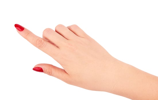 female hand on white photo
