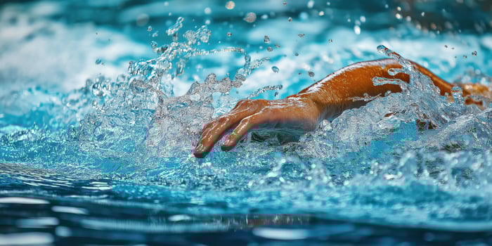 Focused swimmer in action photo