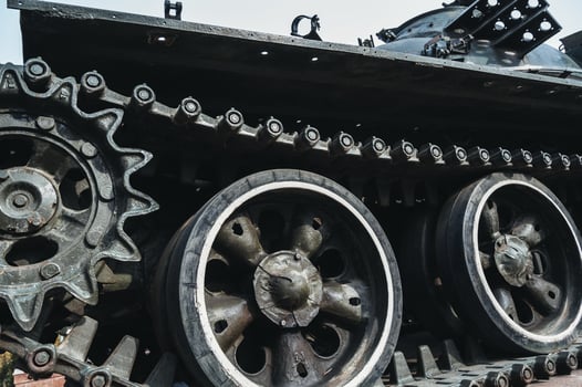 metal old caterpillar track of military army metal Soviet tank in close up photo
