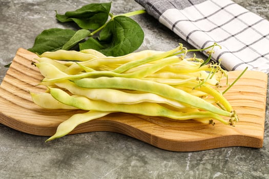 Raw green bean strings heap photo