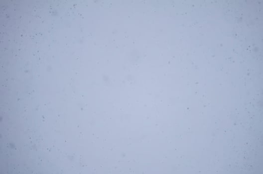 Blurred winter nature background. Snow overlay. photo