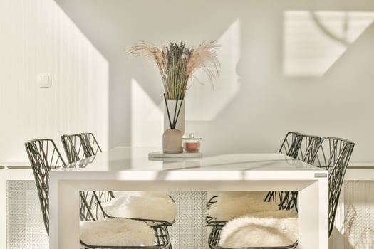 A white table with four chairs photo