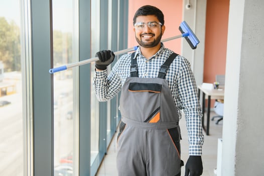 A man cleaning windows. men washes the windows photo