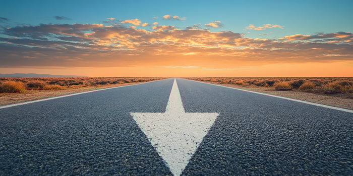 An asphalt highway symbolizes progress and adventure, framed by a stunning sunset that ignites our desire to explore and highlights the limitless possibilities in our upcoming journeys photo