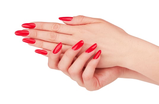 red manicure on white photo